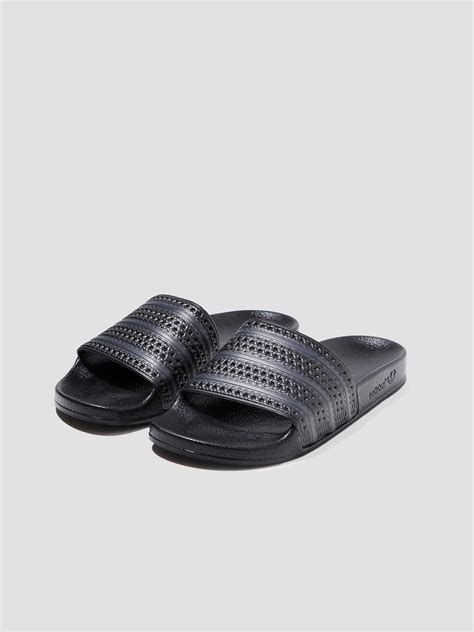 black adidas slip ons|adidas adilette core black.